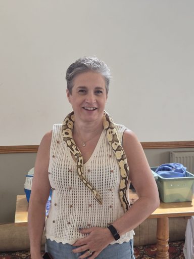 Having your photo taken with a snake