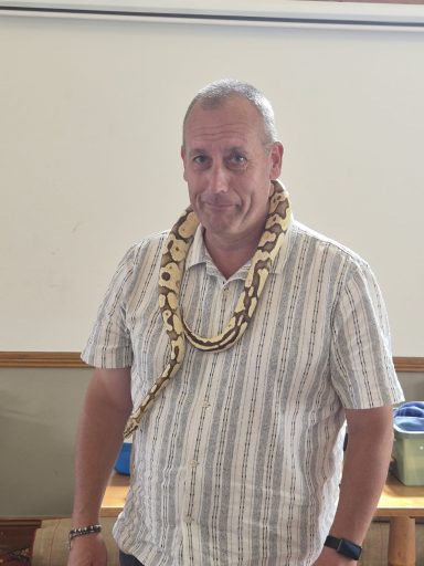 Having your picture taken with a snake